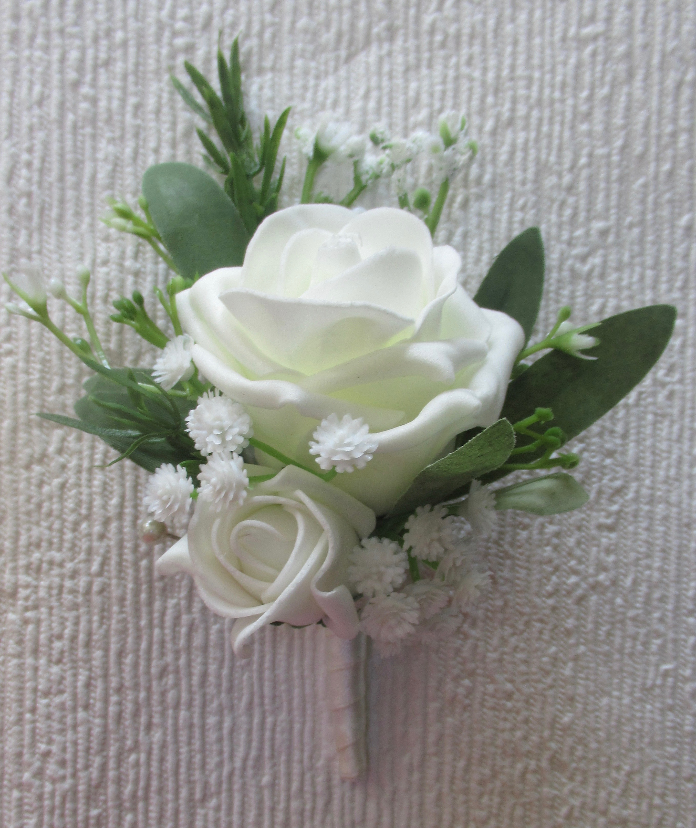 Rose and olive leaf buttonhole
